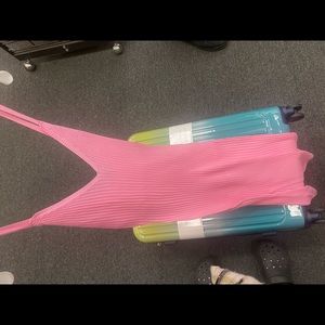 Brand new medium dress really cute spring/summer dress . I love it breast to big